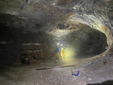 Rehabilitation work on 8 Level, with ore collected during development work being stockpiled