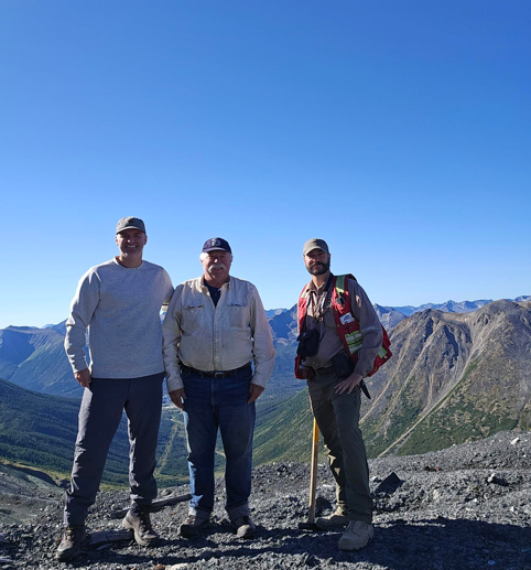 Figure 4: CEO Rob Birmingham, Director Gerry Diakow and head geologist Michael Garagan pose over Magno project, August 2025
