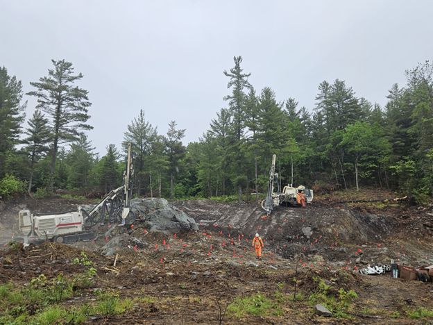 Photo of vertical blast hole drilling of waste on the 007 North Pit.