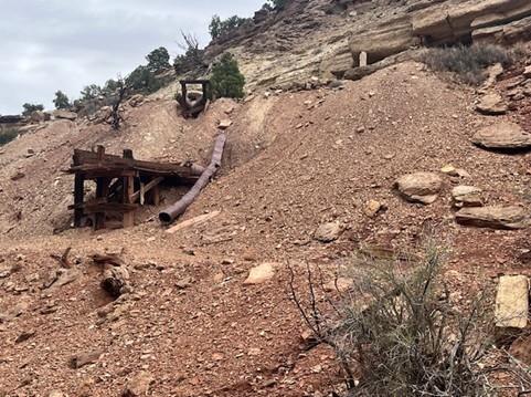 A wooden structure on a hill AI-generated content may be incorrect.