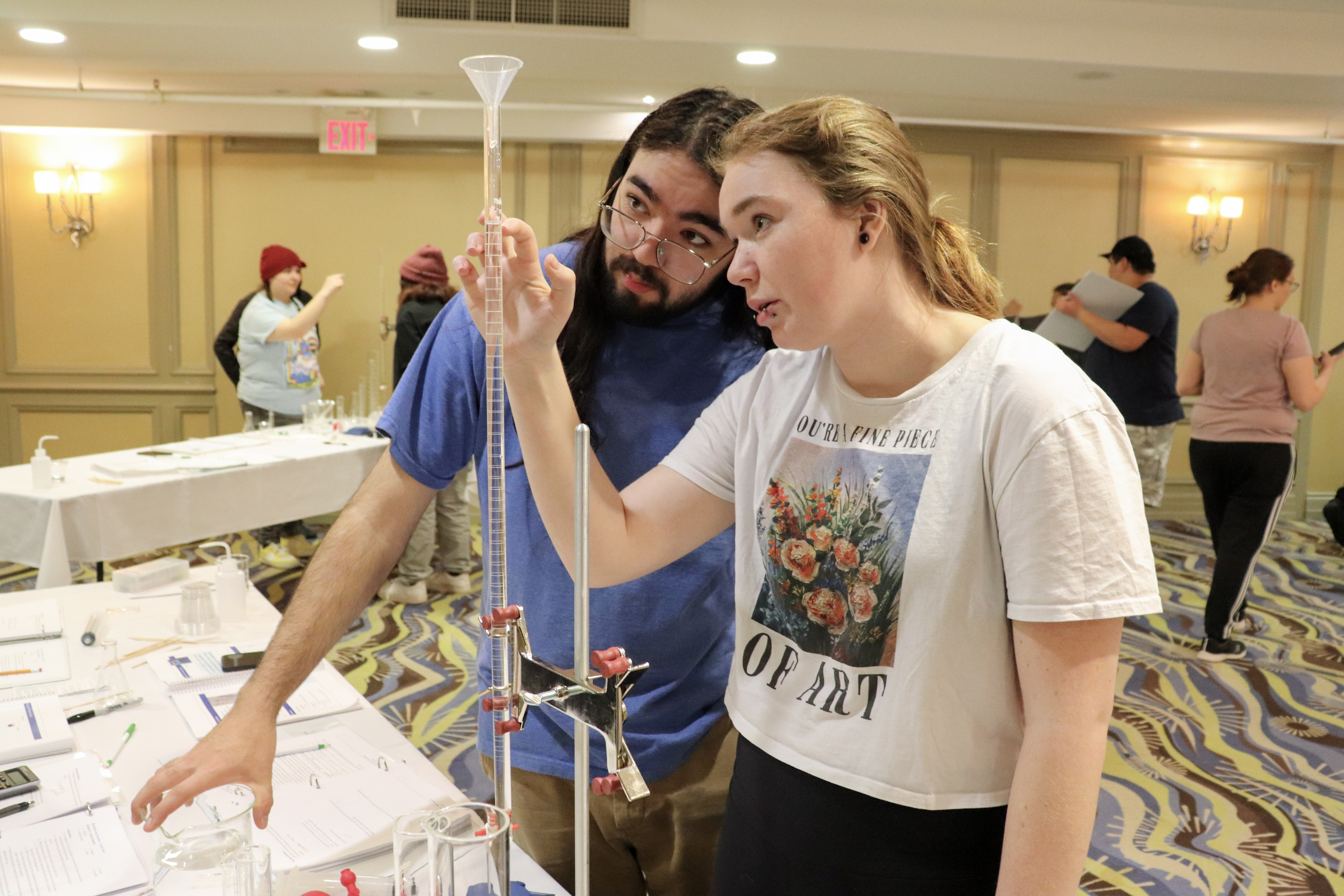 Water First Interns, performing an alkalinity titration during the weeklong preparation for the Water Quality Analyst exam
